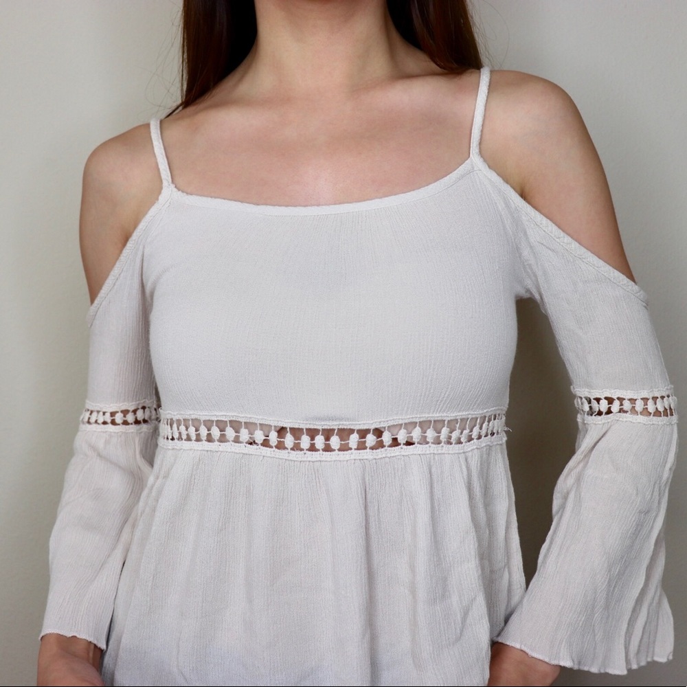 Flowy beige top, shoulder cut off